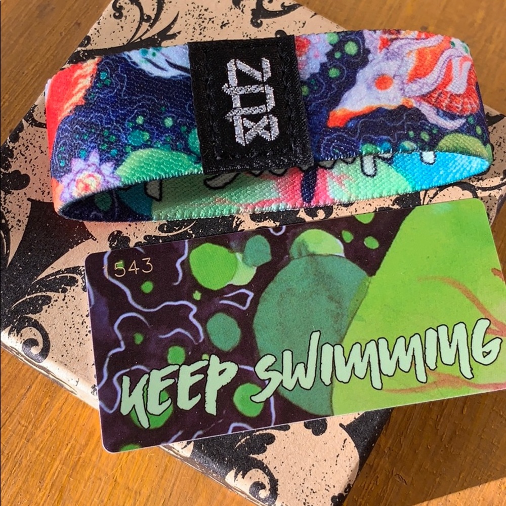 Keep swimming zox wristband.